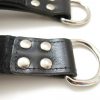 set-leather-suspension-cuffs-black-close-up-hooks