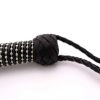steel-chain-tail-flogger-leather-handle-close-up