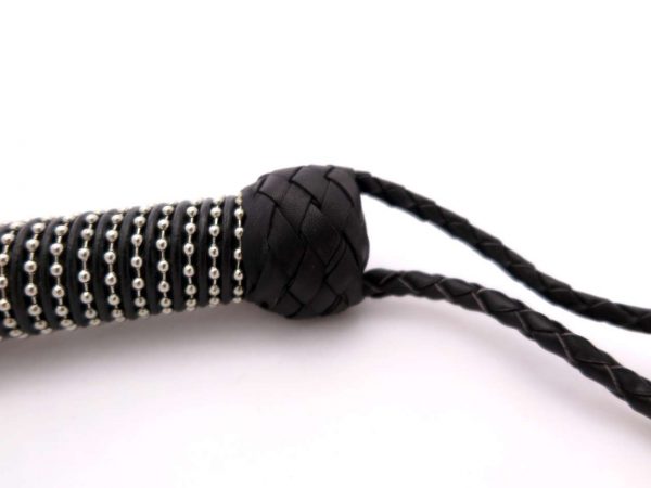 steel-chain-tail-flogger-leather-handle-close-up